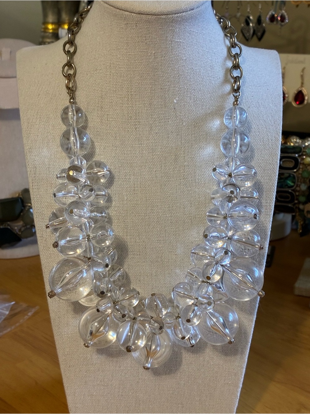 Vintage-style clear acrylic bead cluster statement necklace.